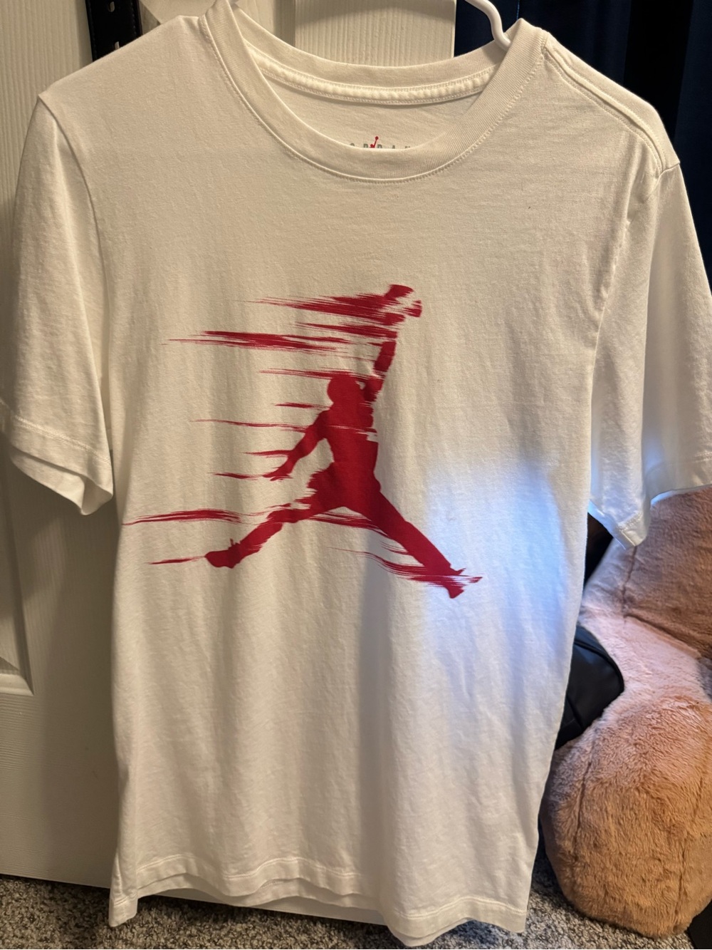 Nike White Short Sleeve Tee with Red Jumping Logo